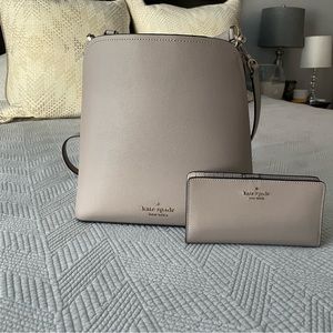 Light grey Kate Spade bucket purse with matching wallet